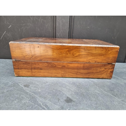 1009 - A Victorian figured walnut and parquetry writing slope, 50cm wide.