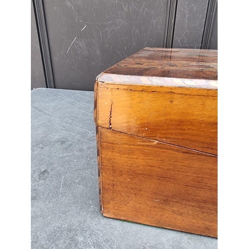 1009 - A Victorian figured walnut and parquetry writing slope, 50cm wide.