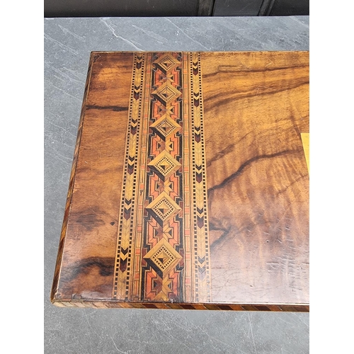 1009 - A Victorian figured walnut and parquetry writing slope, 50cm wide.