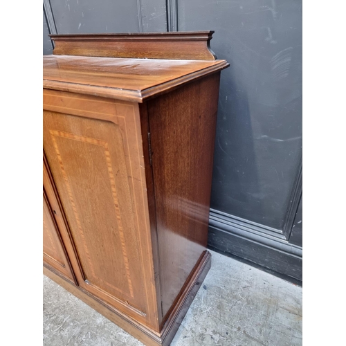 1013 - An Edwardian mahogany, satinwood crossbanded and line inlaid side cabinet, 75cm wide. ... 