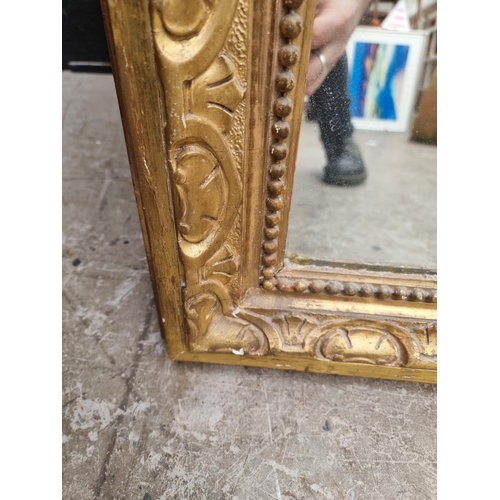 1017 - A large Victorian gilt framed wall mirror, 186 x 118cm.