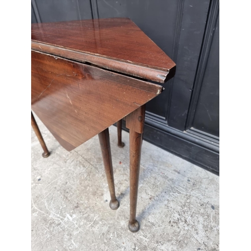 1018 - An antique mahogany triangular gateleg table, 83.5cm wide. 