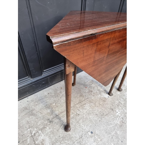 1018 - An antique mahogany triangular gateleg table, 83.5cm wide. 