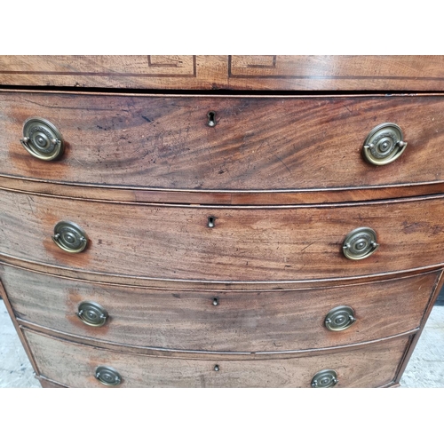 1033 - A Regency mahogany bowfront chest of drawers, 106cm wide. 