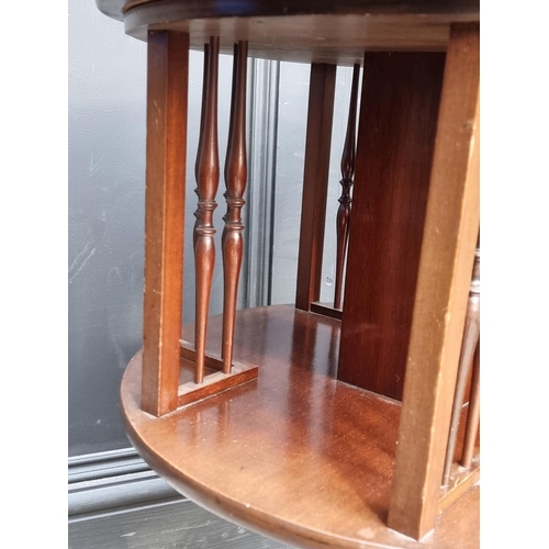 1036 - An Edwardian mahogany and inlaid circular revolving pedestal bookcase, 73cm high x 52cm diamete... 