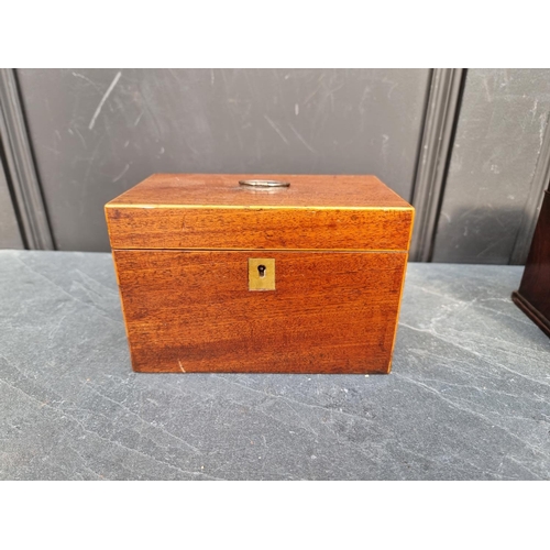 1037 - A George III mahogany sarcophagus tea caddy, with concealed drawer, 24.5cm wide; together with anoth... 