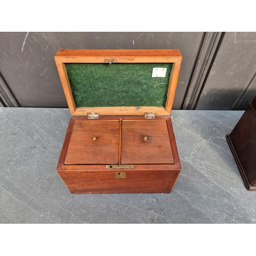 1037 - A George III mahogany sarcophagus tea caddy, with concealed drawer, 24.5cm wide; together with anoth... 