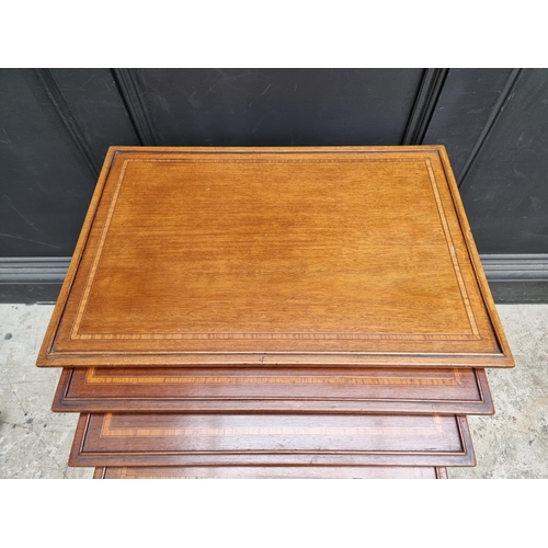 1039 - A set of Edwardian mahogany and satinwood banded quartetto tables, largest 56cm wide. ... 