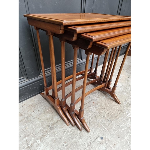 1039 - A set of Edwardian mahogany and satinwood banded quartetto tables, largest 56cm wide. ... 