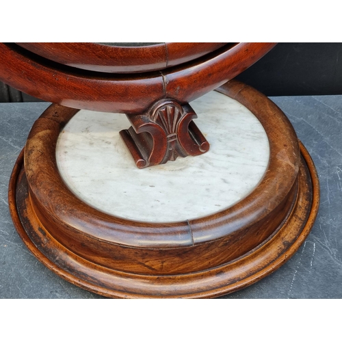 1040 - An unusual 19th century mahogany and marble toilet mirror, 61cm high. 
