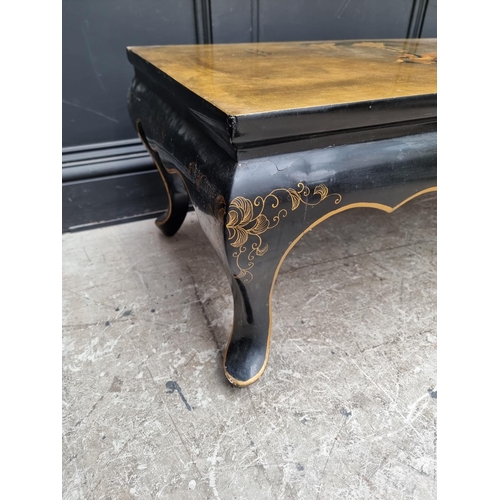 1043 - A Chinese black and gilt lacquered rectangular low occasional table, 105cm wide. ... 