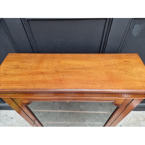 1049 - An early 20th century mahogany pier cabinet, 80.5cm wide. 