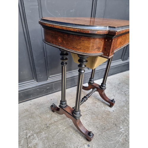 1054 - A Victorian burr walnut, ebonized and inlaid work table, indistinctly stamped 'Lamb, Manchester', 62... 