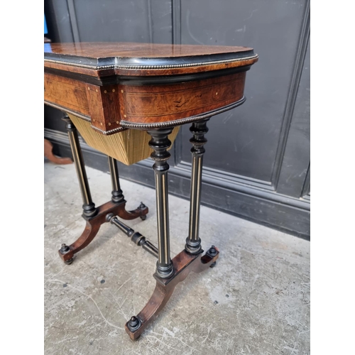 1054 - A Victorian burr walnut, ebonized and inlaid work table, indistinctly stamped 'Lamb, Manchester', 62... 