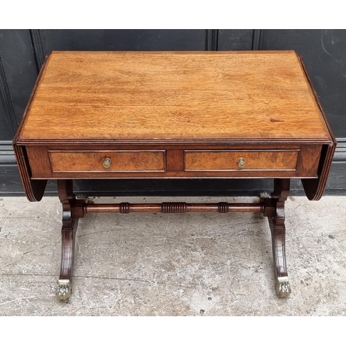 1066 - A small reproduction mahogany and crossbanded drop leaf coffee table, of sofa table form, 67.5c... 