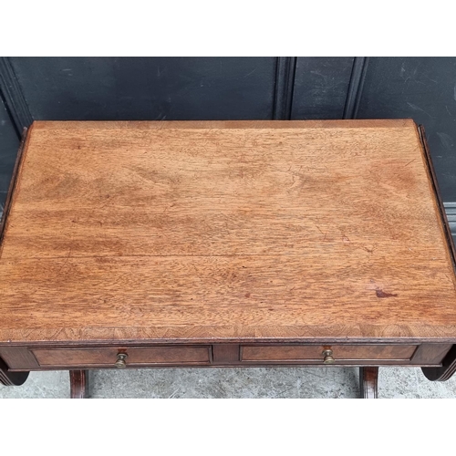 1066 - A small reproduction mahogany and crossbanded drop leaf coffee table, of sofa table form, 67.5c... 