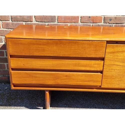 1100 - A mid-century teak sideboard, by White & Newton, labelled, 216.5cm wide.