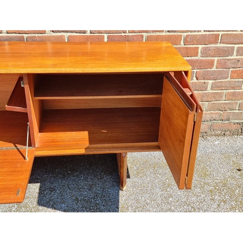 1100 - A mid-century teak sideboard, by White & Newton, labelled, 216.5cm wide.