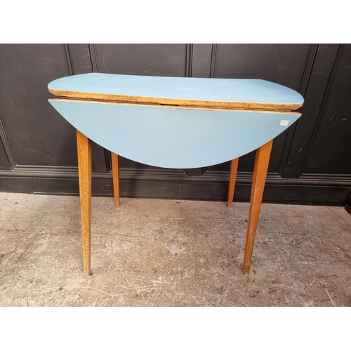 1102 - A mid-century drop leaf kitchen table, 90cm wide.