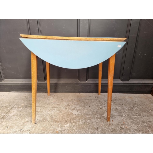 1102 - A mid-century drop leaf kitchen table, 90cm wide.