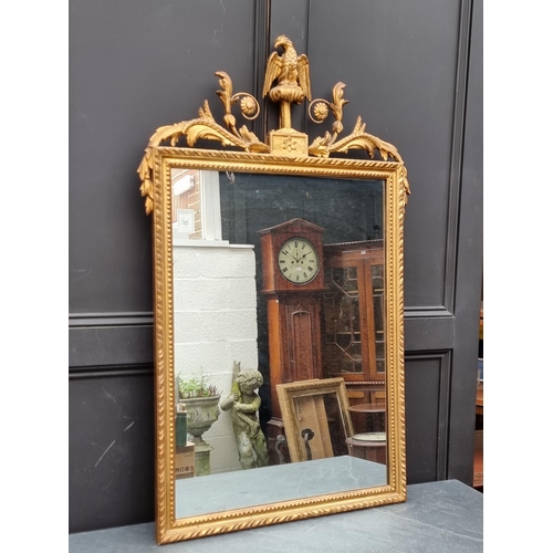 1104 - A gilt wood framed wall mirror, 121 x 75cm.