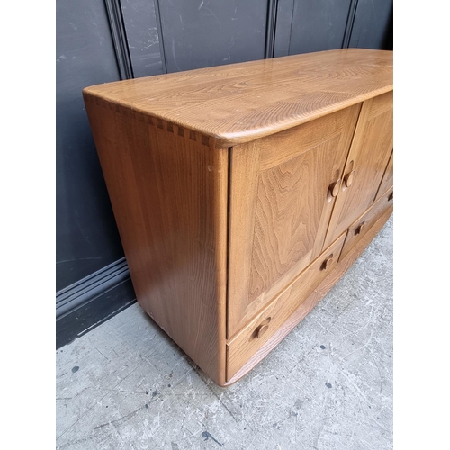 1105 - A mid-century Ercol sideboard, 129.5 wide.