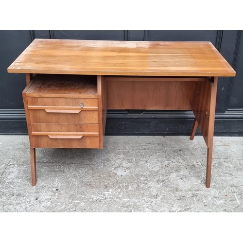 1107 - A mid-century continental walnut desk, 110cm wide.