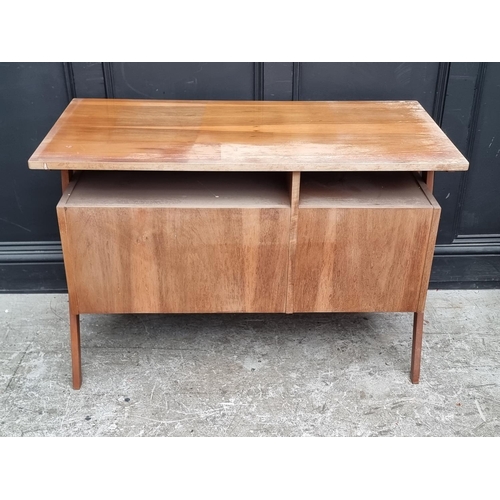 1107 - A mid-century continental walnut desk, 110cm wide.