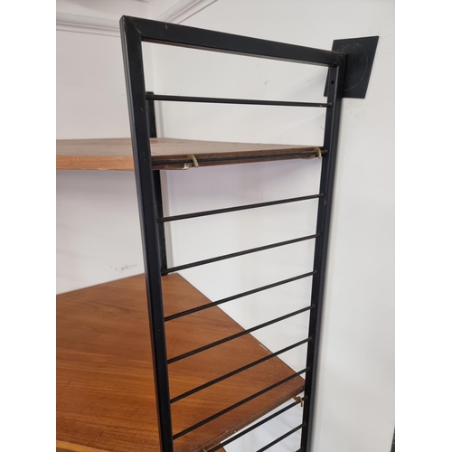 1109 - A scarce mid-century Ladderax corner unit.