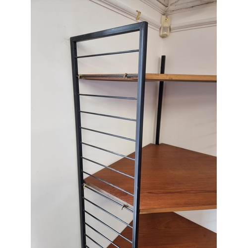 1110 - A scarce mid-century Ladderax corner unit.