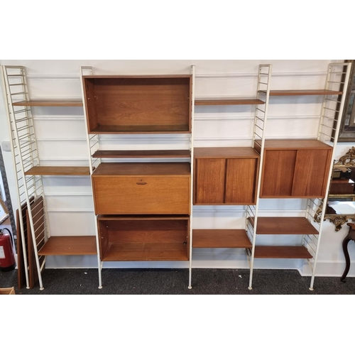 1111 - A mid-century Ladderax modular five bay shelving unit, white.