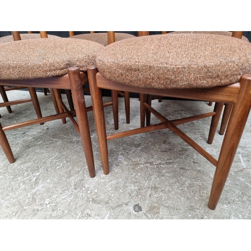 1113 - A mid-century G-Plan teak extending dining table and six chairs, the table 168.5cm extended.... 