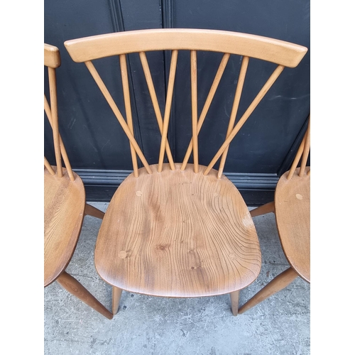 1115 - A set of four mid-century Ercol 'Candlestick' dining chairs.