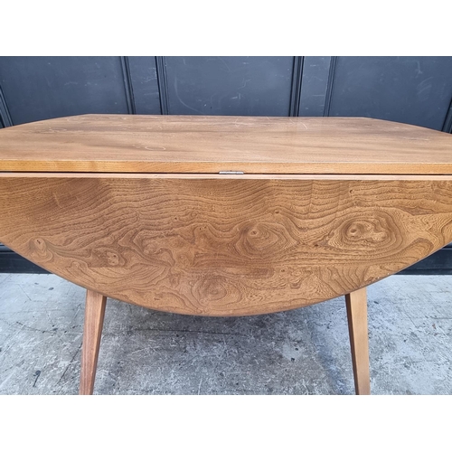 1116 - A mid-century Ercol Windsor drop leaf dining table, 113cm wide.