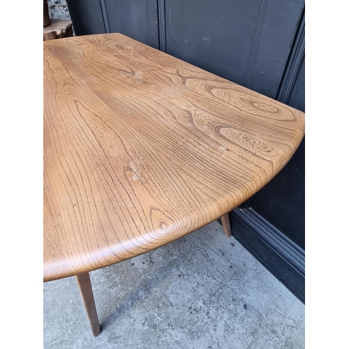 1116 - A mid-century Ercol Windsor drop leaf dining table, 113cm wide.