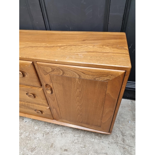 1117 - A mid-century Ercol sideboard, 155.5cm wide.