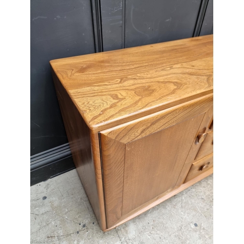 1117 - A mid-century Ercol sideboard, 155.5cm wide.