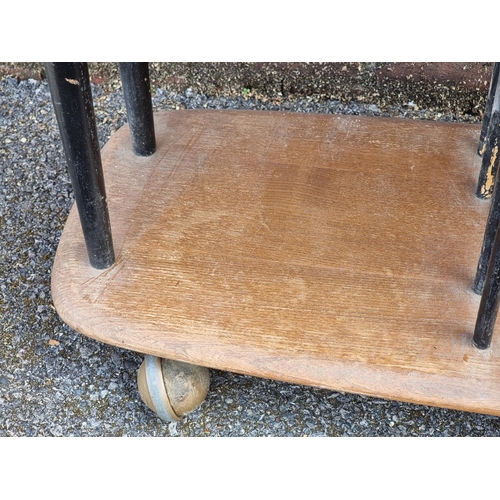 1119 - A mid-century Ercol 'Giraffe' tea trolley, 91cm wide.