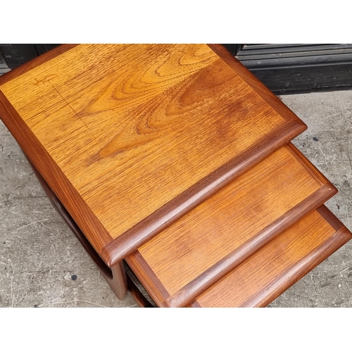 1120 - A nest of three mid-century G-Plan 'Astro' coffee tables, largest 50cm wide.