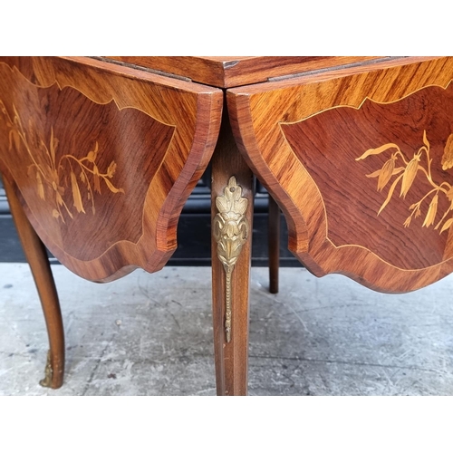 1127 - An Italian marquetry low drop leaf occasional table, with brass mounts, 105cm wide when open.... 