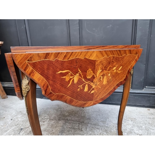 1127 - An Italian marquetry low drop leaf occasional table, with brass mounts, 105cm wide when open.... 