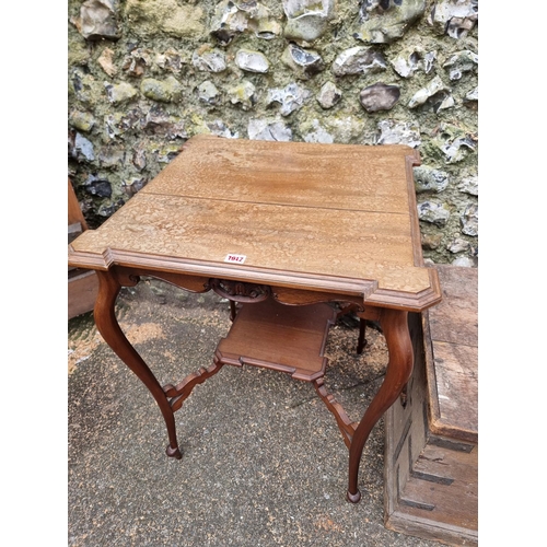 1131 - A late Victorian mahogany centre table, with platform undertier, 60cm wide; together with a 19th cen... 