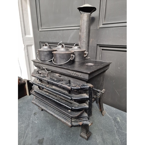 1140 - A scarce 19th century French cast iron miniature stove, inscribed 'Dupont, Fallon', the top 37c... 