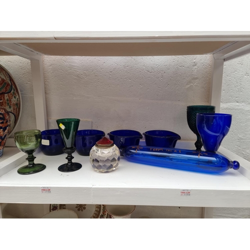 1153 - A collection of coloured glass, to include Bristol blue.