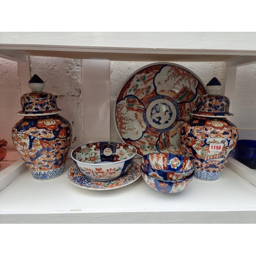 1158 - A collection Japanese Imari porcelain, to include a charger, 35cm diameter. (7)