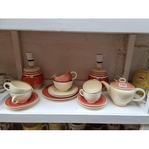 1164 - A Susie Cooper part tea set; together with a pair of Gray's Pottery table lamps, total height 22.5cm... 