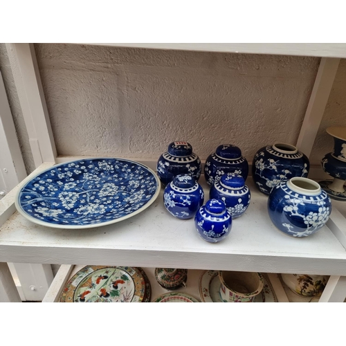 1173 - Seven Chinese blue and white ginger jars and five covers, largest 12.5cm high; together with a blue ... 