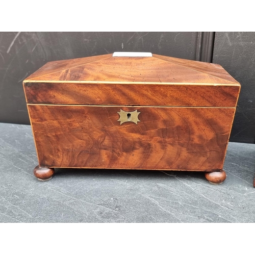 1189 - Two Georgian mahogany tea caddies, largest 29.5cm wide.