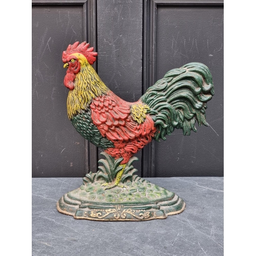 1192 - A polychrome painted cast iron cockerel doorstop, 30cm high.