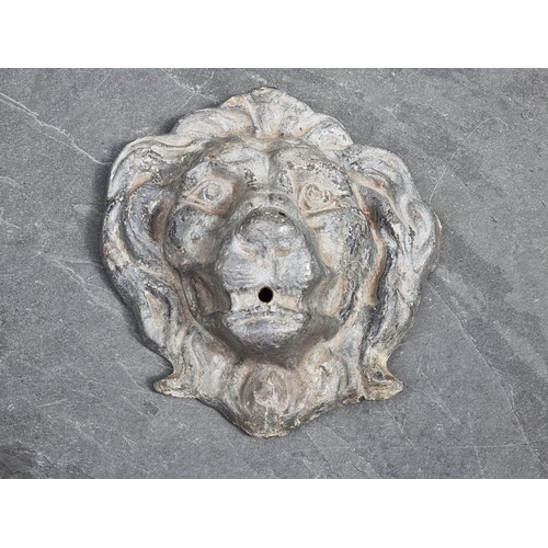 1193 - A lead lion mask fountain head, 21.5cm wide.